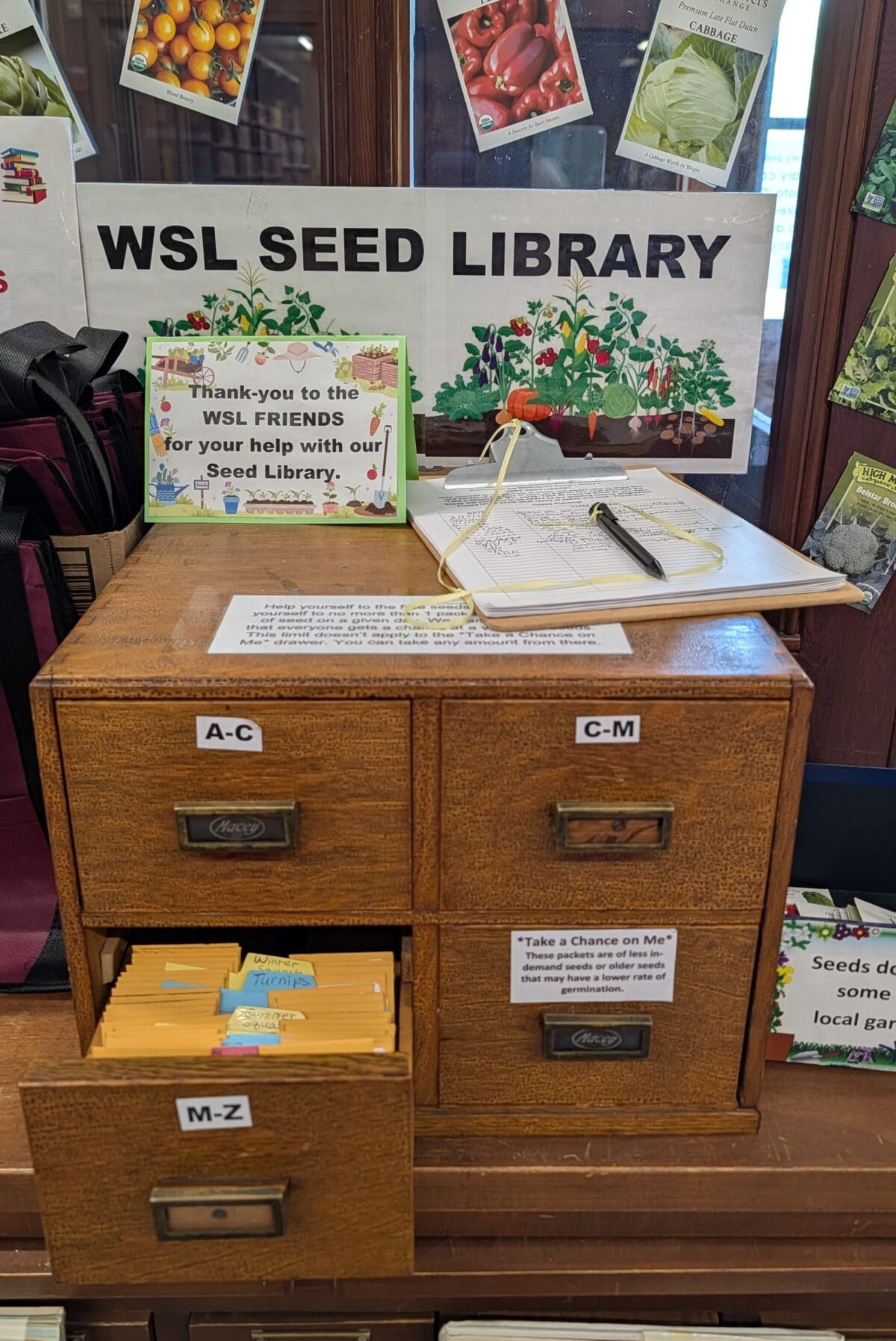 seed library is brown card catalog with four drawers.